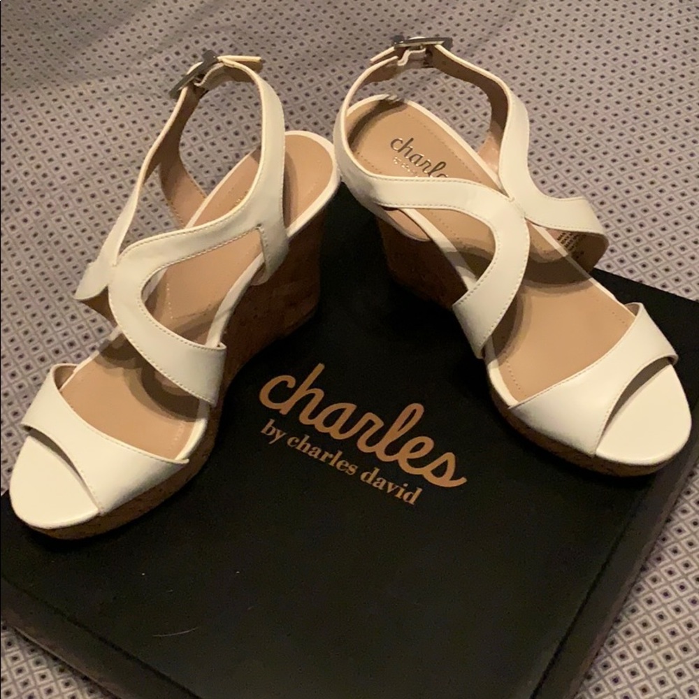 2 pairs of Charles David shoes,  1 white, 1 black